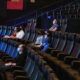 How can movie theatres attract customers